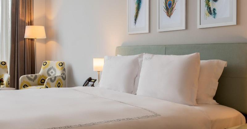Crystal Inn Hotel - Alamein (Adults Only) 엘 알라메인 외부 사진 A bed with two pillows